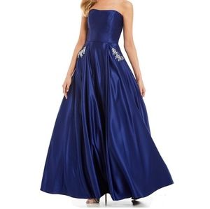 Strapless jeweled pocket satin gown